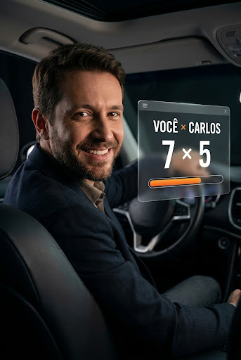 Motorista brasileiro no carro com placar do Duelo flutuando